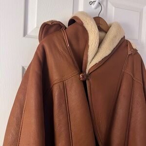 Edwardo Bassoni full length jacket. Genuine shearling.